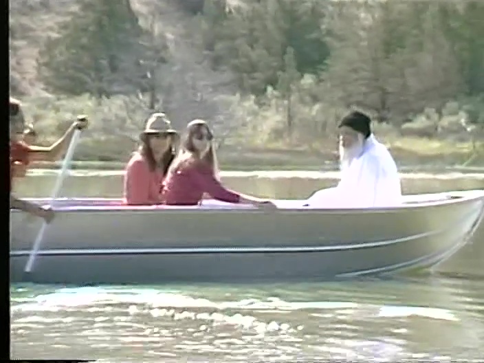 File:Osho Sheela Vivek Rowboat on Lake Patanjali (1982) ; still 01m 43s.jpg