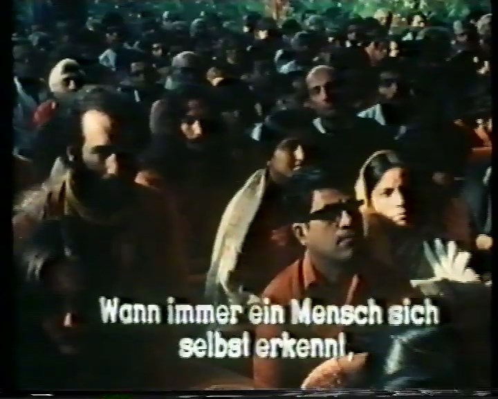 File:Bhagwan (1978) ; 18min 17sec --Swami Anand Prageet-- (left).jpg