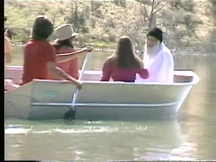 File:Osho Sheela Vivek Rowboat on Lake Patanjali (1982) ; still 00m 17s.jpg