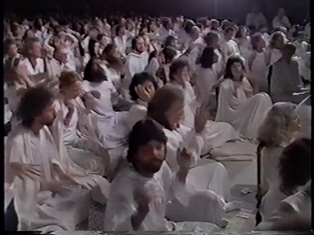 File:Osho Morning Meditation (1990) ; still 04m 41s.jpg