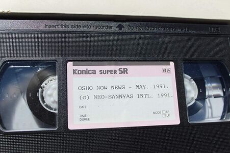 VHS tape. The cassette has the inscription "8 of 12".
