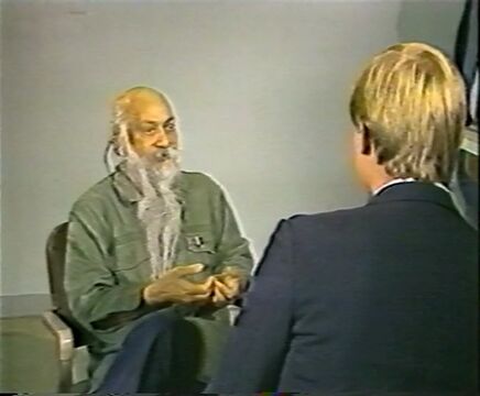 still from Anurag - Osho in Jail (1985) at 3m 13s: interview with Channel 6 TV.