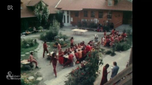 still 03m 26s. WDR report shows the commune’s patio