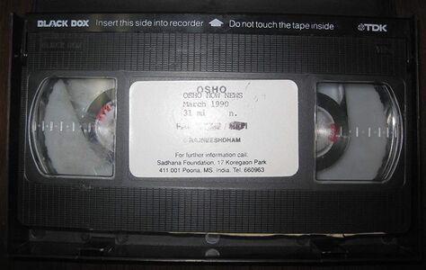 VHS Cassette. The cassette has the inscription "Custom video. 1 of 12".