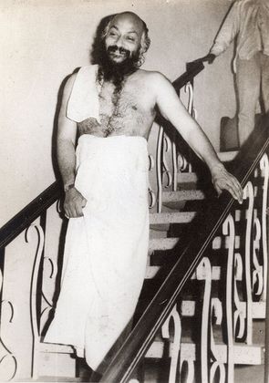 descending the stairs at Chamanlal's house