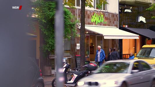 still 40m 51s. Shows current Cafe and restaurant Osho’s place, Cologne