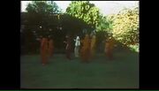 Thumbnail for File:Ashram in Poona - Bhagwans Experiment (1979) (version A)&#160;; still 01h 32m 50s.jpg