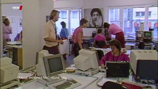still 22m 02s. Shows office of Uta commune (from german TV report 1984)