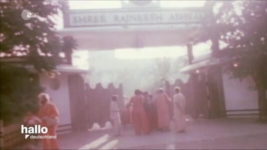 still 03m 13s. Gate of Poona Ashram 1970s